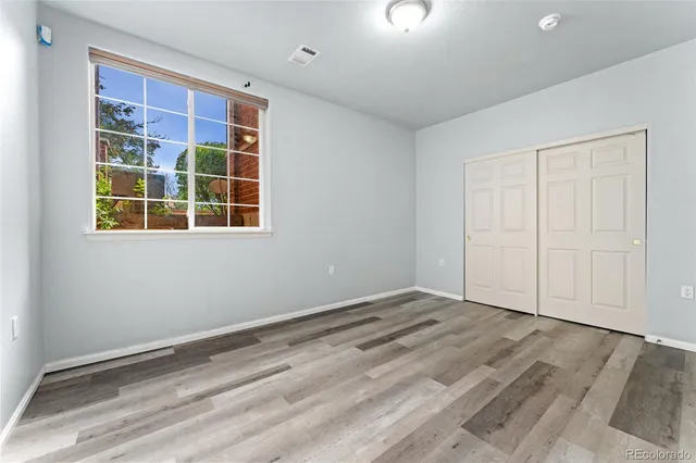 an empty room with windows