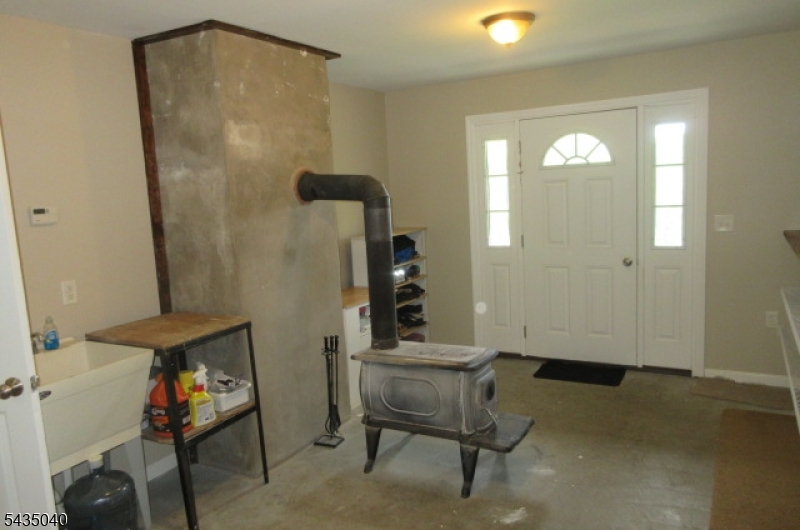 28 Beaver Run Road Lafayette, NJ 07848 - Photo 10 of 36 a view of a livingroom with furniture and windows