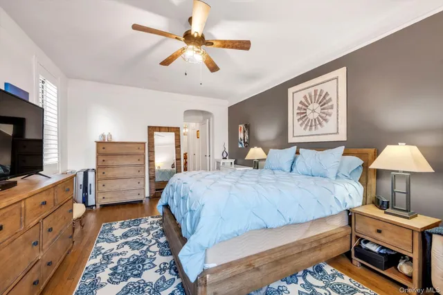 a bedroom with a bed and furniture