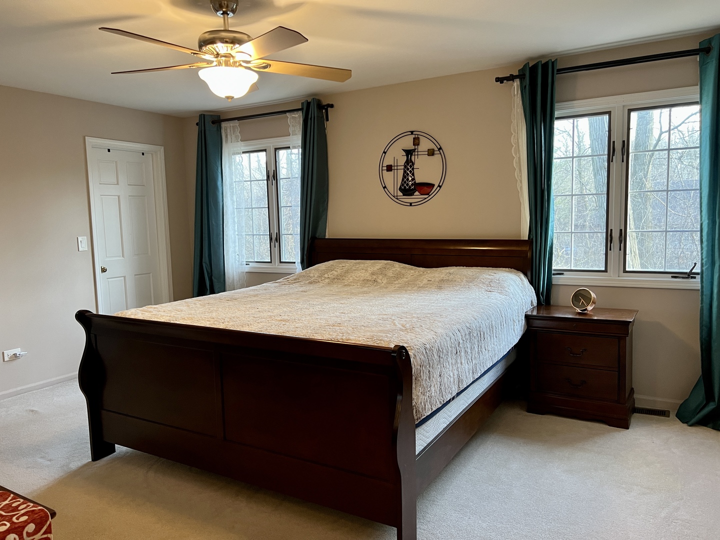 815 Suffield Square Lincolnshire, IL 60069 - Photo 20 of 27 a bedroom with a bed and a window