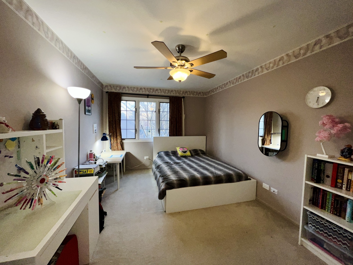 815 Suffield Square Lincolnshire, IL 60069 - Photo 24 of 27 a bedroom with furniture and a chandelier