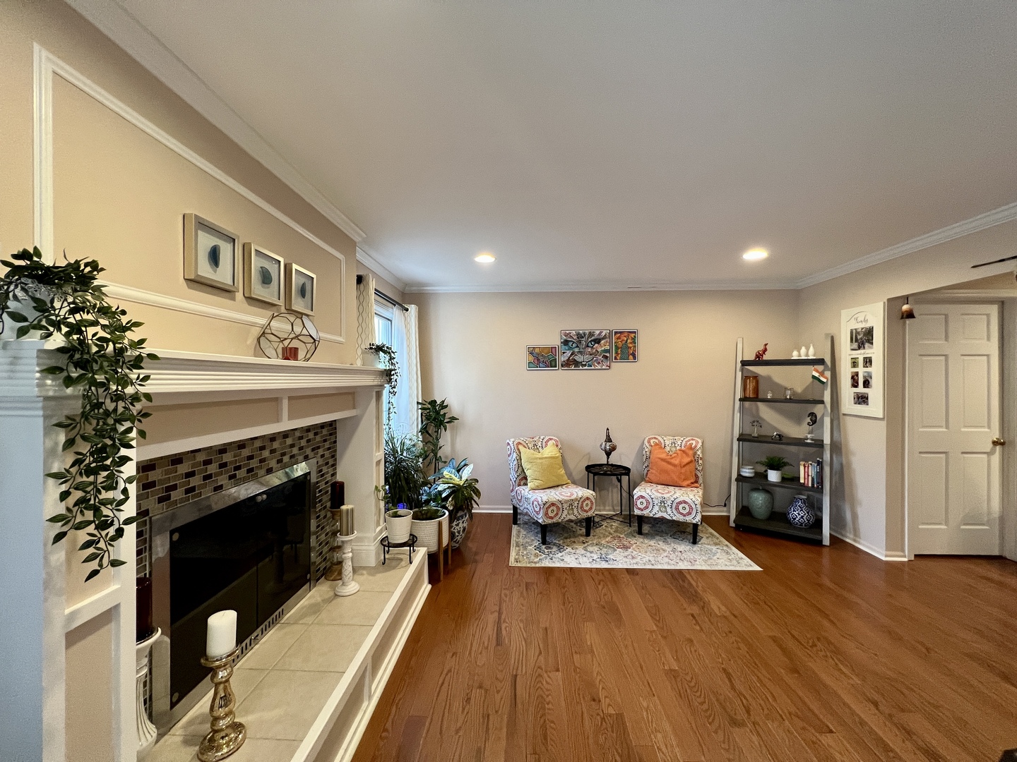 815 Suffield Square Lincolnshire, IL 60069 - Photo 6 of 27 a living room with furniture and a fireplace