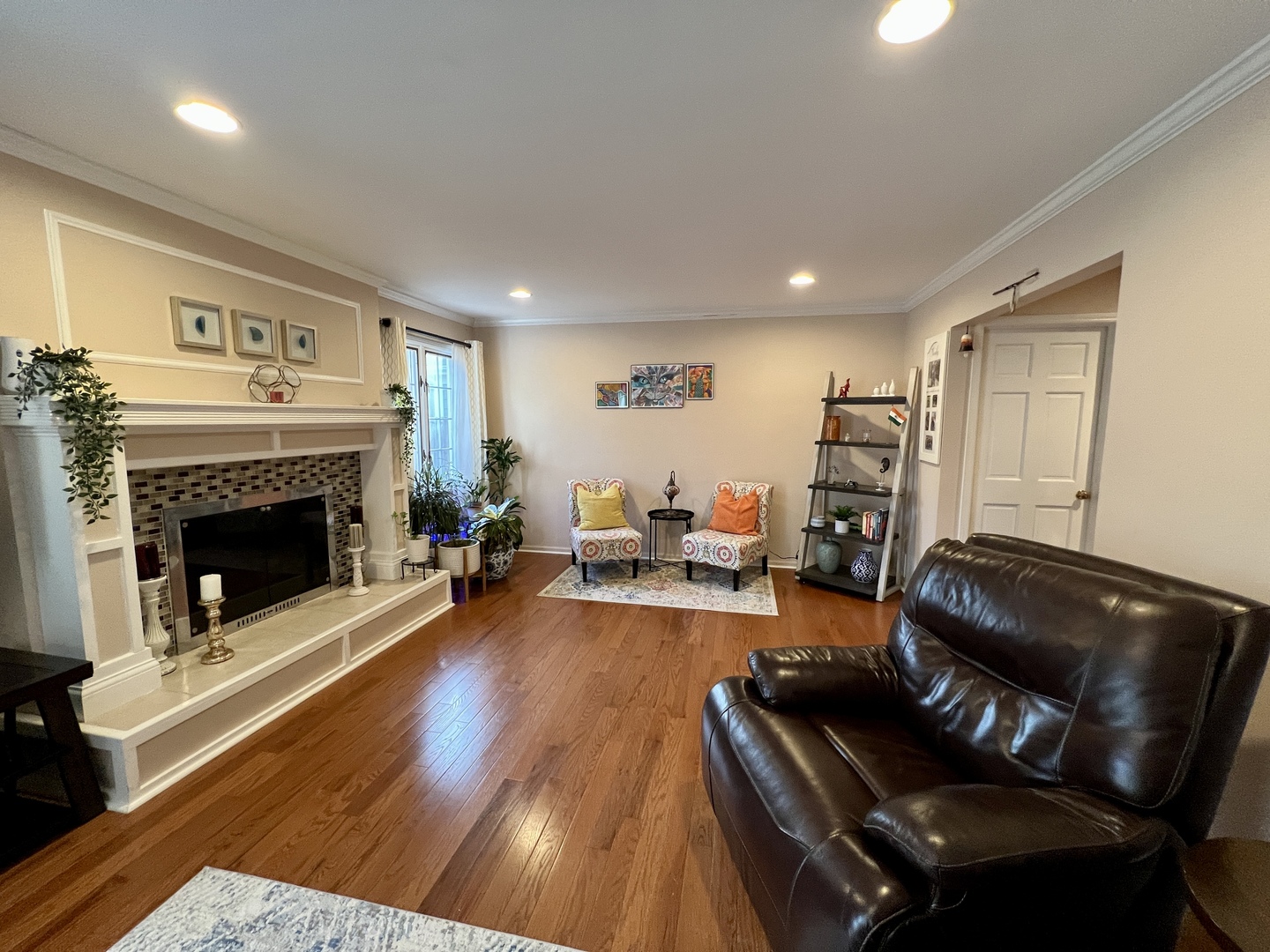 815 Suffield Square Lincolnshire, IL 60069 - Photo 7 of 27 a living room with furniture and a fireplace