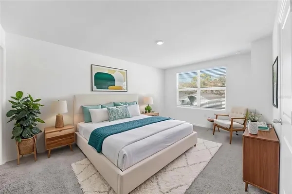 a view of a chairs and table in patio