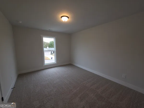 a view of empty room with window