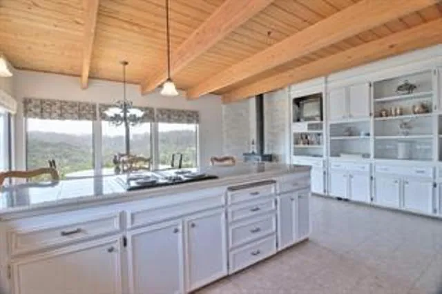 a open kitchen with cabinets