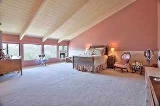 a room with furniture and a chandelier