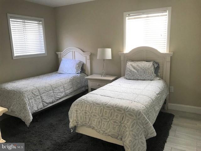 35 Summer Place, Unit 19 Bethany Beach, DE 19930 - Photo 3 of 14 first floor bedroom