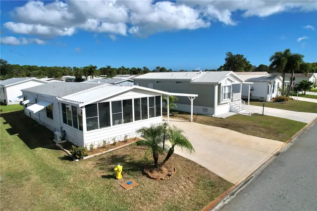 $169,700 | 818 Tamarind Circle, Barefoot Bay, FL 32976