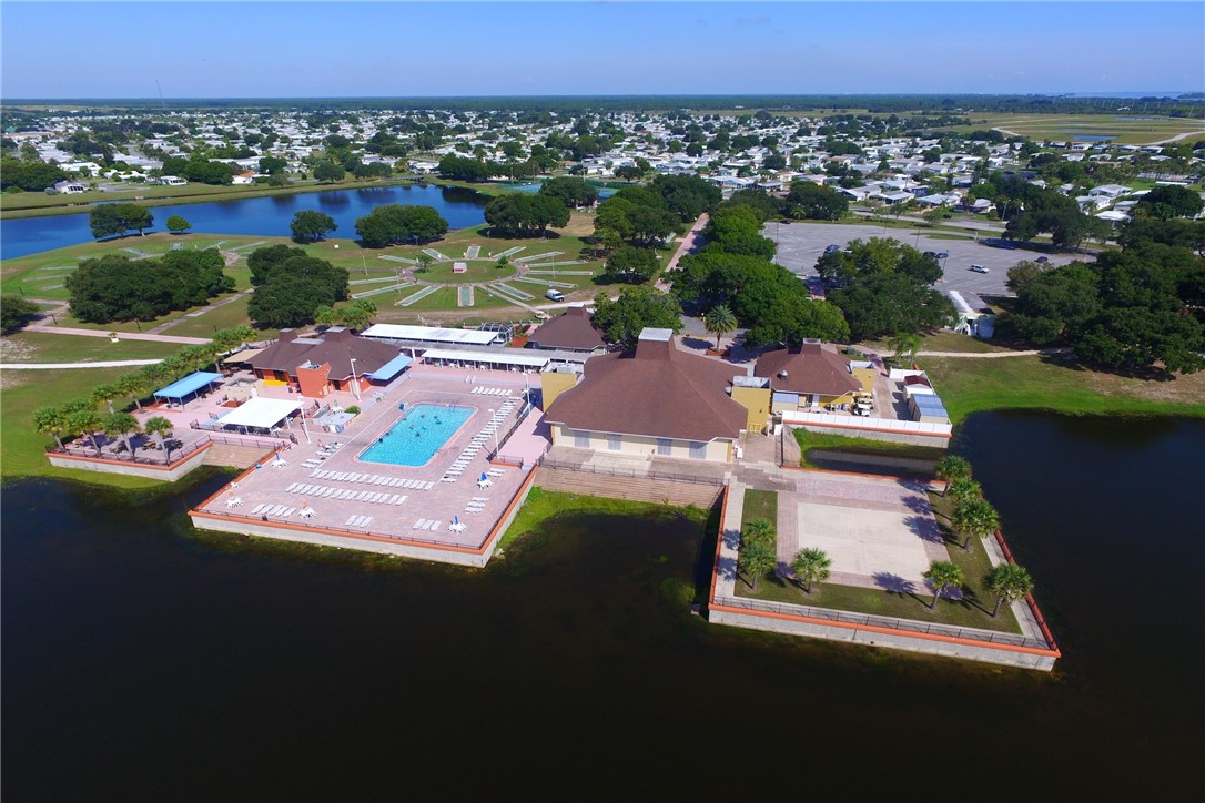 818 Tamarind Circle Sebastian, FL 32976 - Photo 20 of 31 an aerial view of residential houses with outdoor space and swimming pool