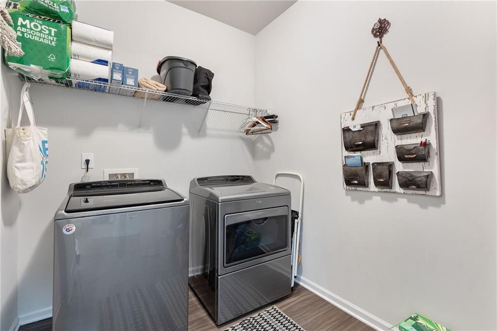 1718 Landon Lane Braselton, GA 30517 - Photo 23 of 52 a kitchen with a stove and a microwave