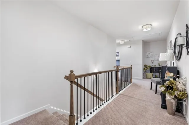 a bedroom with bed and window