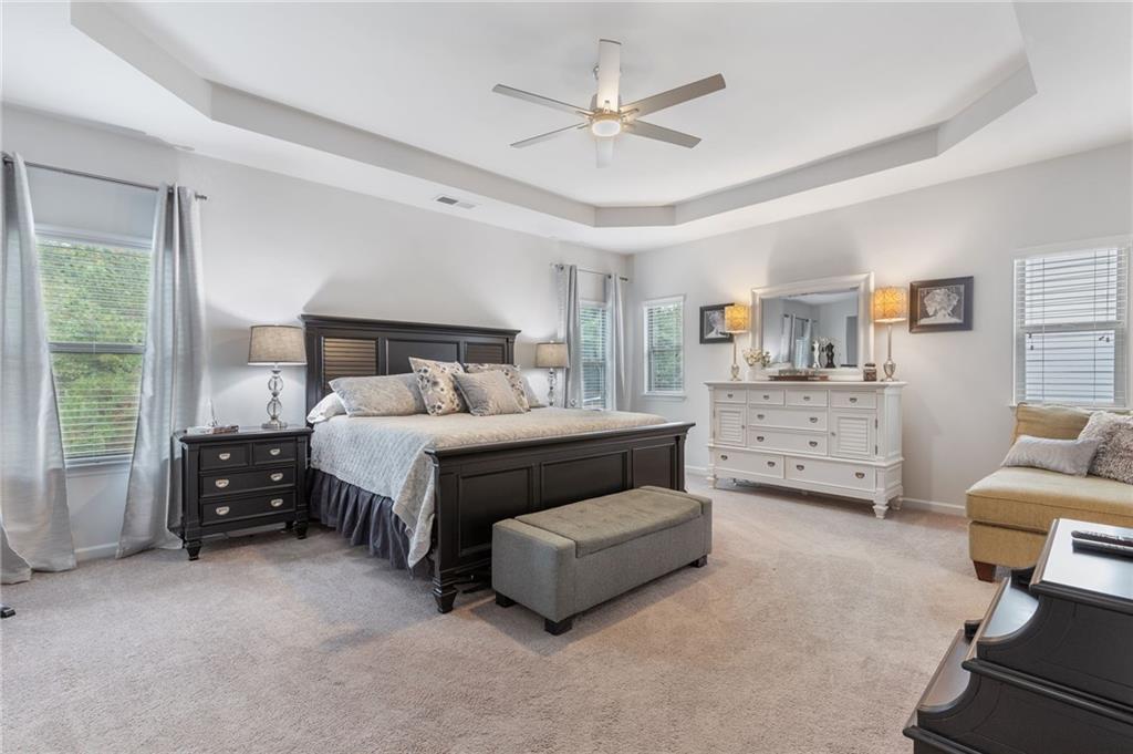 1718 Landon Lane Braselton, GA 30517 - Photo 25 of 52 a bedroom with bed and window