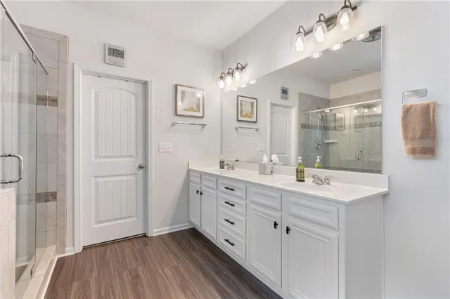 a bathroom with a bathtub and shower