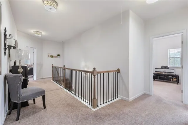 a view of room with lounge chair and windows