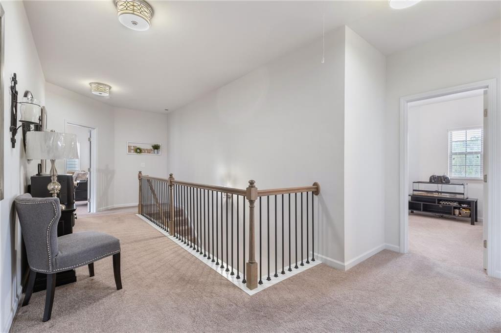 1718 Landon Lane Braselton, GA 30517 - Photo 33 of 52 a view of a livingroom and a livingroom with furniture and a couch
