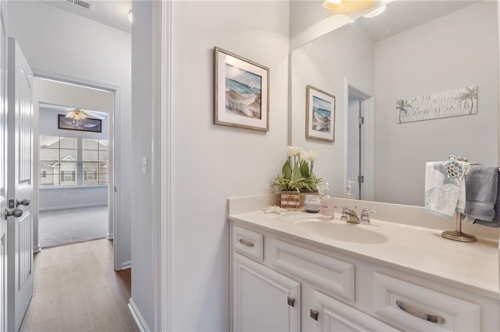 1718 Landon Lane Braselton, GA 30517 - Photo 37 of 52 a bathroom with a sink double vanity and a shower