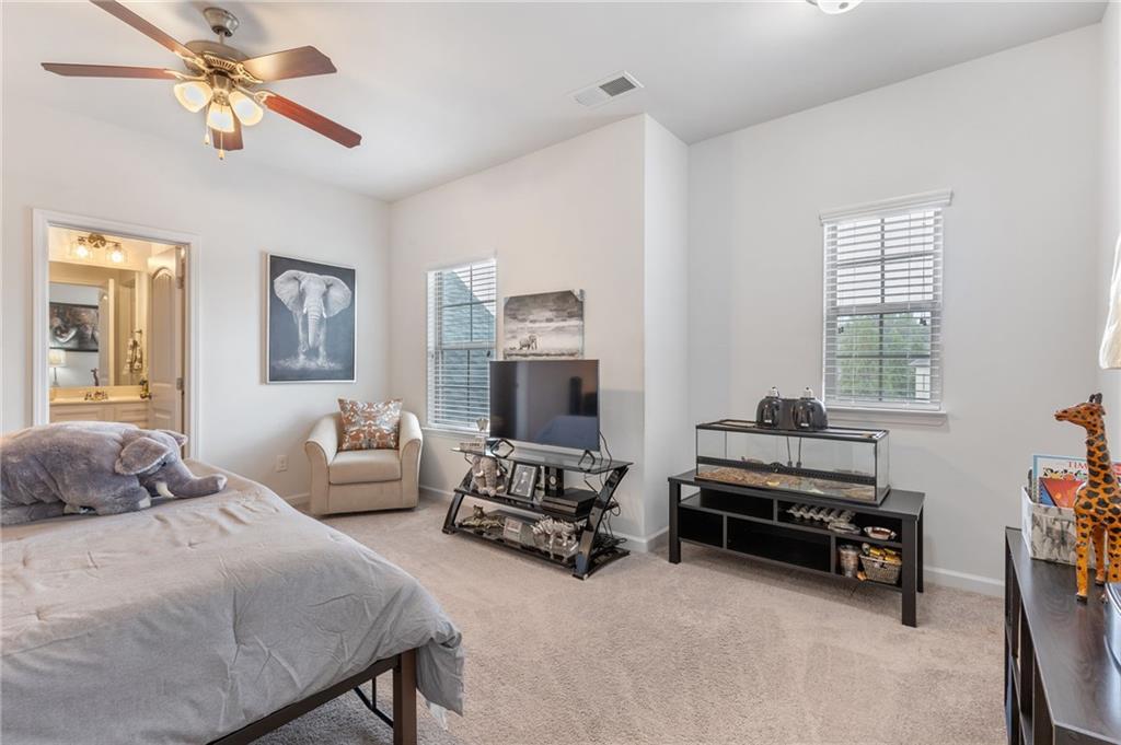 1718 Landon Lane Braselton, GA 30517 - Photo 40 of 52 a bedroom with bed and a window