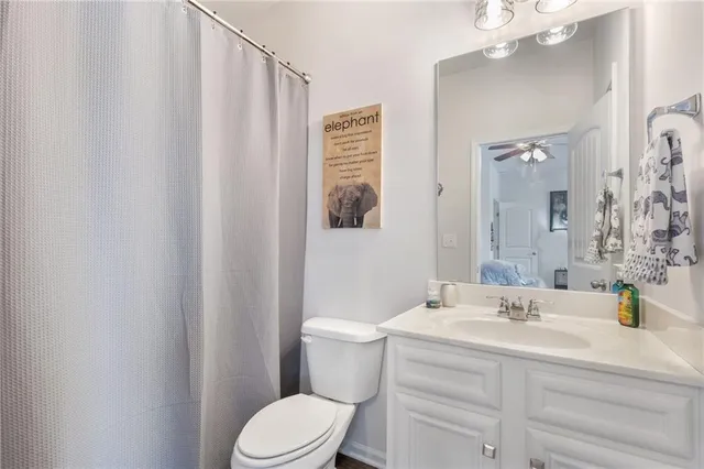 a view of a porch with furniture and garden