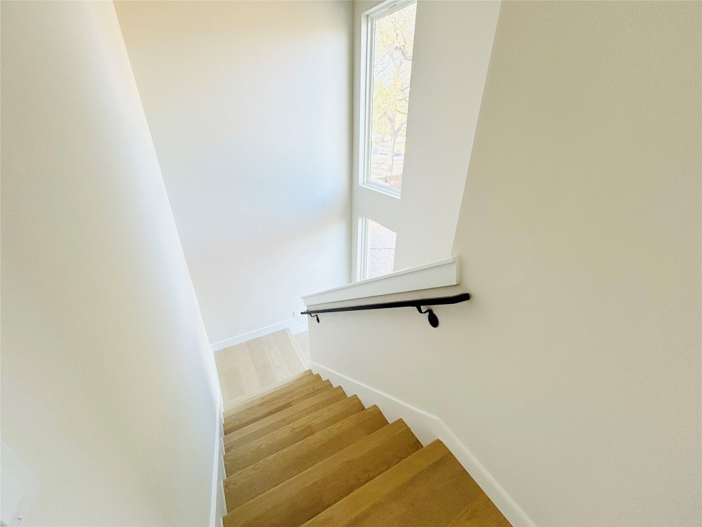4324 Airport Boulevard, Unit B Austin, TX 78722 - Photo 11 of 22 a view of staircase with white walls