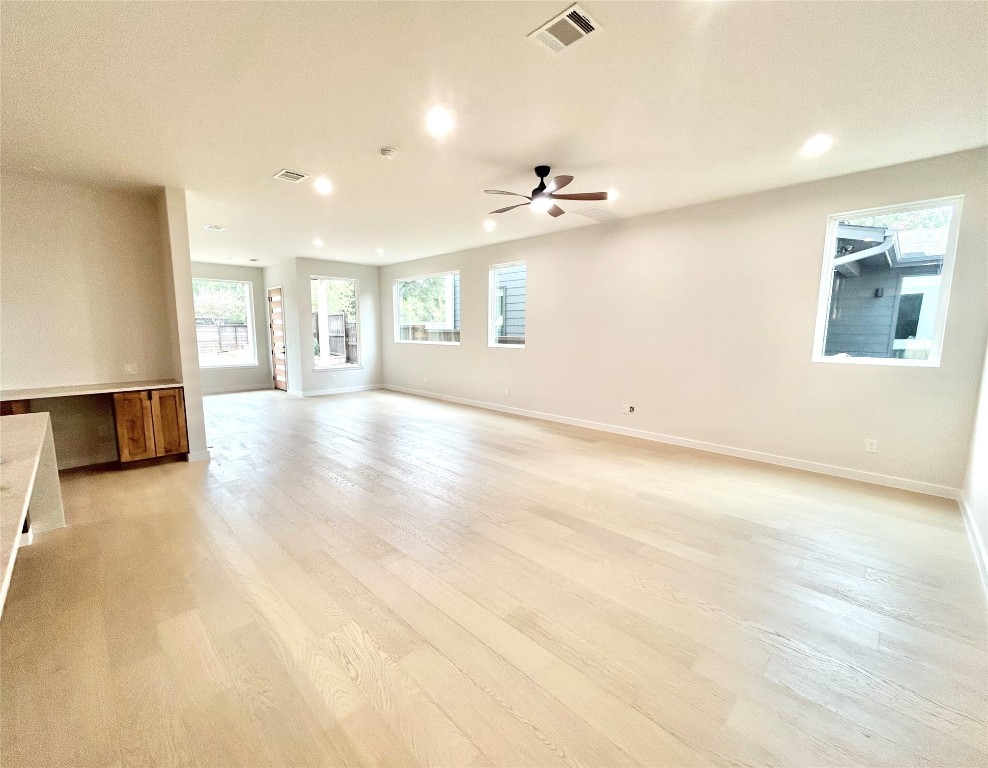 4324 Airport Boulevard, Unit B Austin, TX 78722 - Photo 8 of 22 a view of an empty room with a window