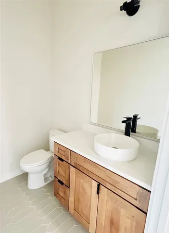 a bathroom with a sink and a toilet