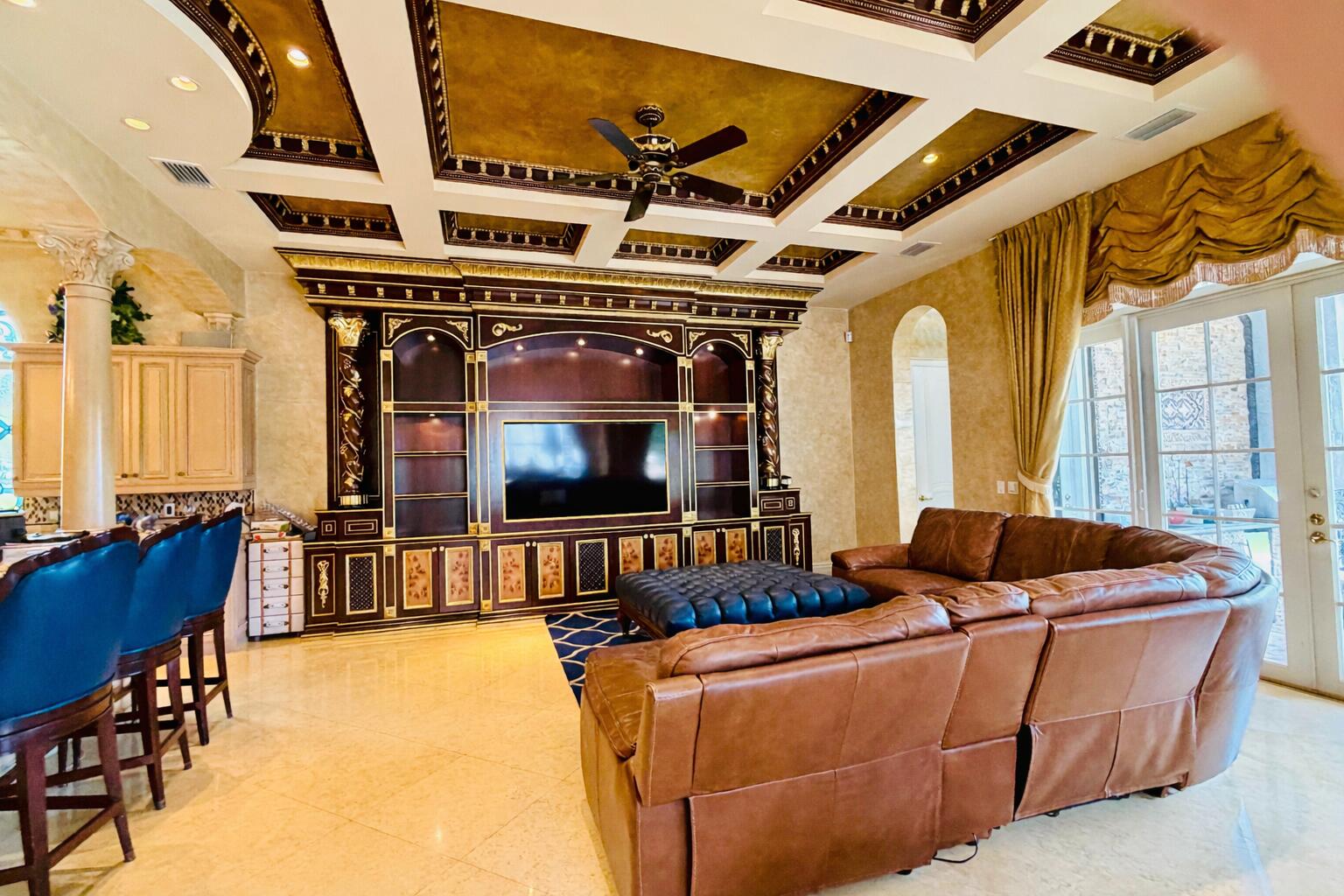 17730 Scarsdale Way Boca Raton, FL 33496 - Photo 14 of 42 a living room with furniture and a flat screen tv