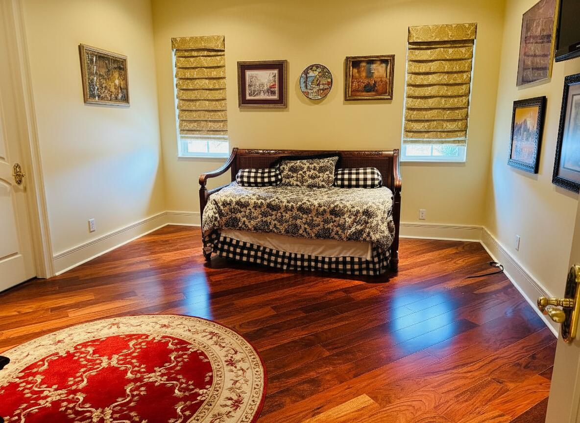 17730 Scarsdale Way Boca Raton, FL 33496 - Photo 28 of 42 a view of a bedroom with wooden floor and window