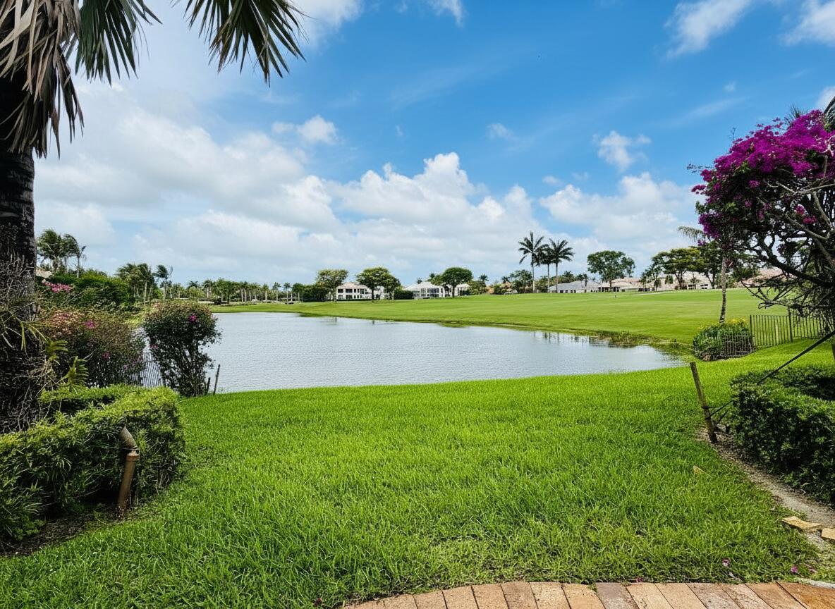 17730 Scarsdale Way Boca Raton, FL 33496 - Photo 3 of 42 a view of a lake with a big yard