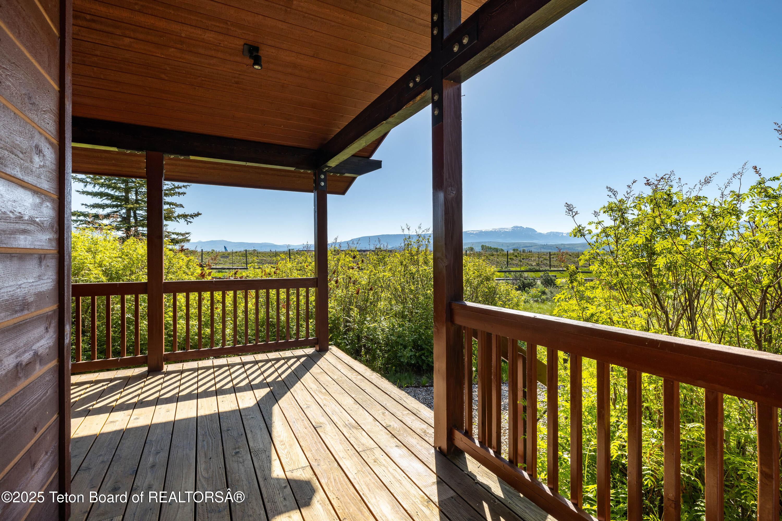 8225 North Spring Gulch Road Jackson, WY 83001 - Photo 30 of 38 Guest House Porch