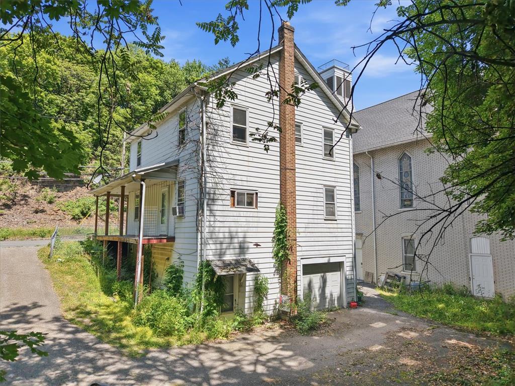 167 Main Road Lehighton, PA 18235 - Photo 35 of 41 A classic facade with charming covered porch, a perfect blend of tradition and comfort.