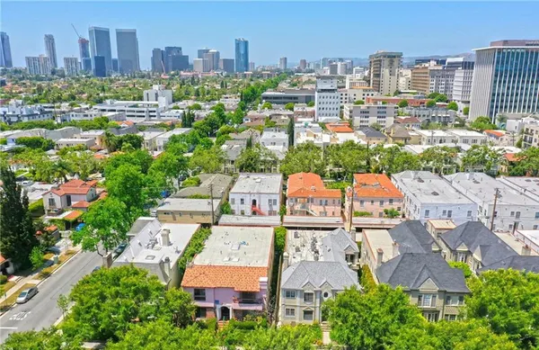 an aerial view of a city with lots of buildings