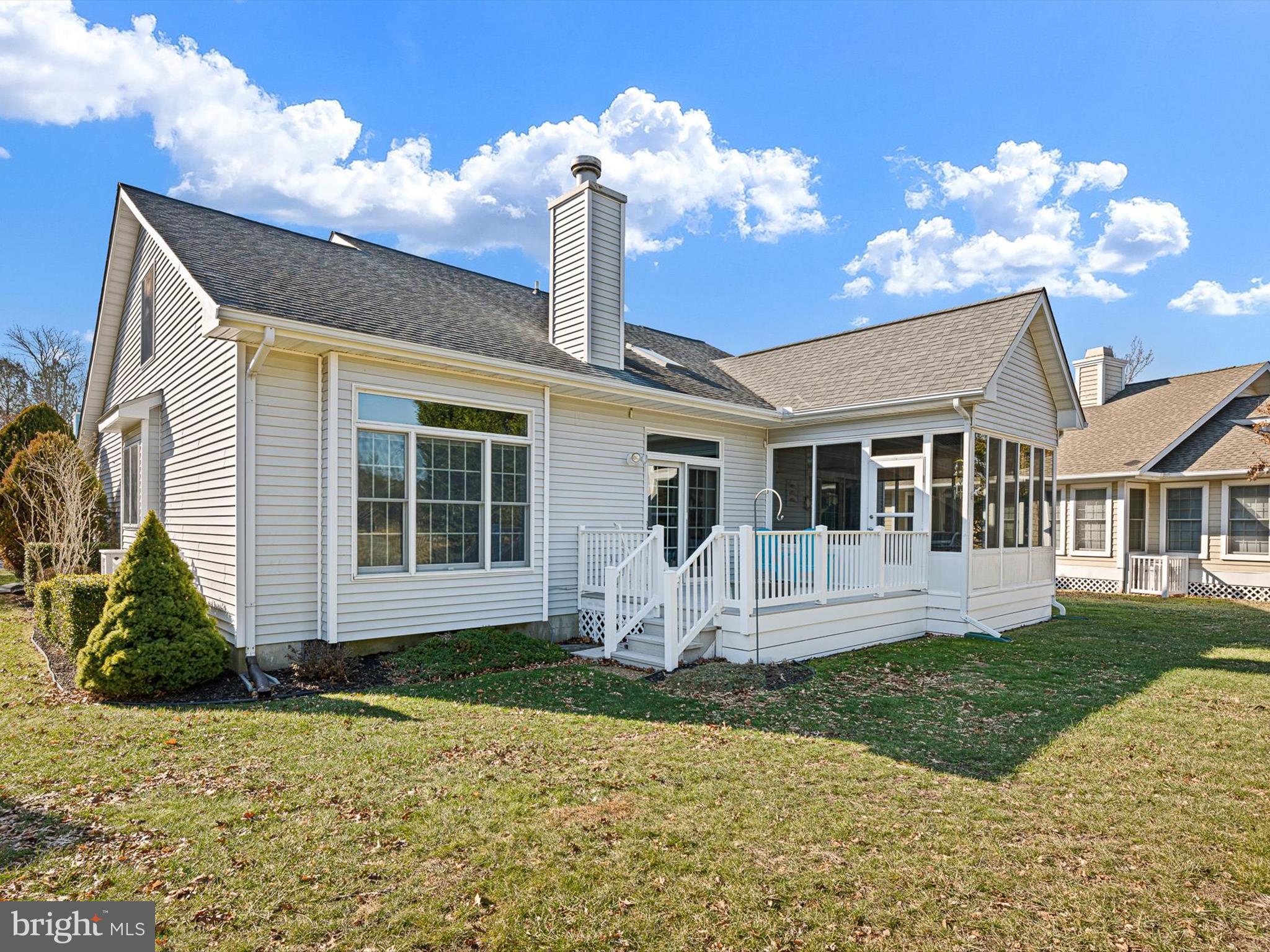 304 Walkabout Road Bethany Beach, DE 19930 - Photo 31 of 62 a front view of a house with garden