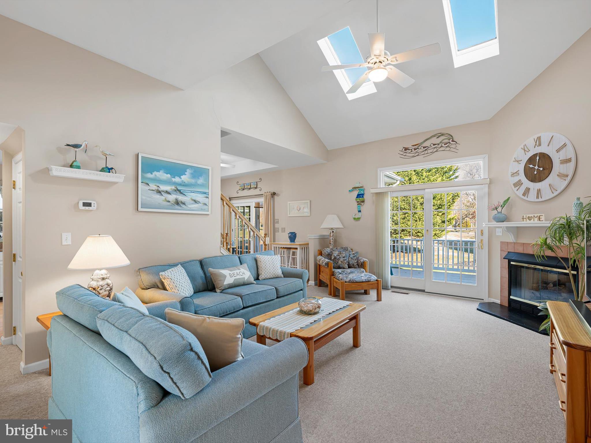 304 Walkabout Road Bethany Beach, DE 19930 - Photo 62 of 62 a living room with furniture and a window