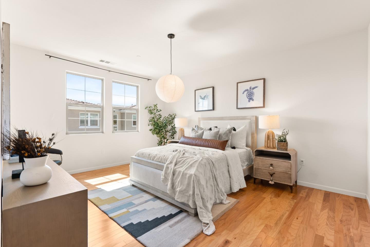 1872 Trento Loop Milpitas, CA 95035 - Photo 12 of 38 a bedroom with a bed and wooden floor