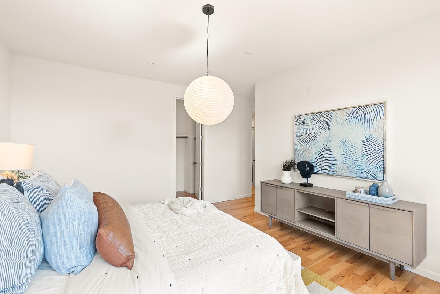 1872 Trento Loop Milpitas, CA 95035 - Photo 14 of 38 a bedroom with a bed and a flat screen tv