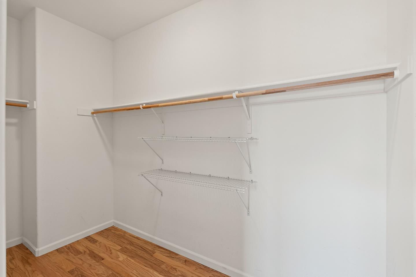 1872 Trento Loop Milpitas, CA 95035 - Photo 17 of 38 a view of a room with racks on the wall