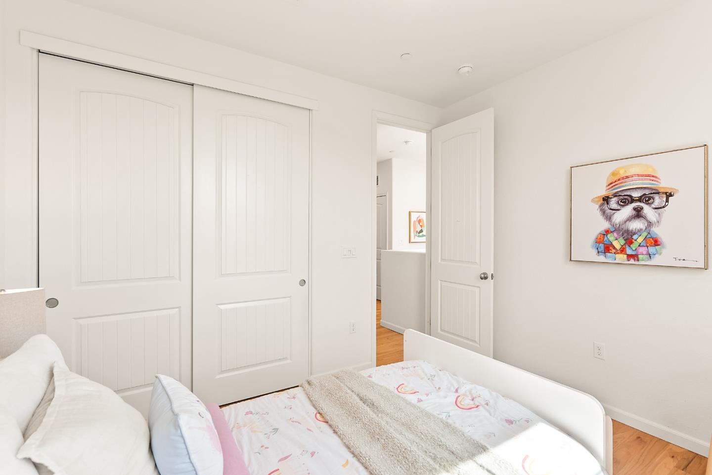 1872 Trento Loop Milpitas, CA 95035 - Photo 21 of 38 a bedroom with a bed and a painting on the wall