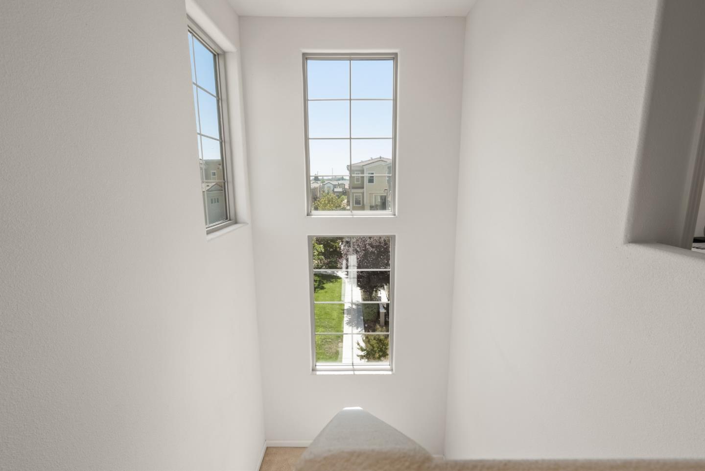 1872 Trento Loop Milpitas, CA 95035 - Photo 22 of 38 a view of an empty room with a window