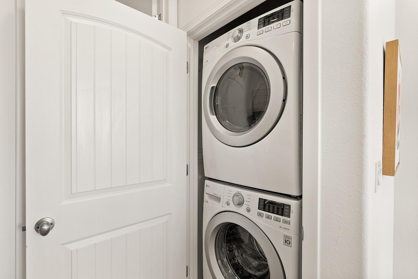 1872 Trento Loop Milpitas, CA 95035 - Photo 26 of 38 a view of a hallway with washer and dryer