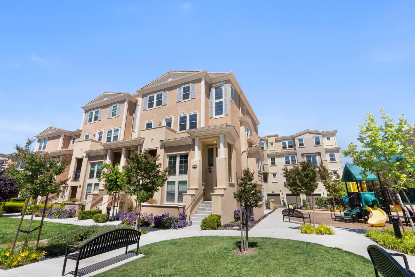 1872 Trento Loop Milpitas, CA 95035 - Photo 3 of 38 a view of residential houses with yard and green space