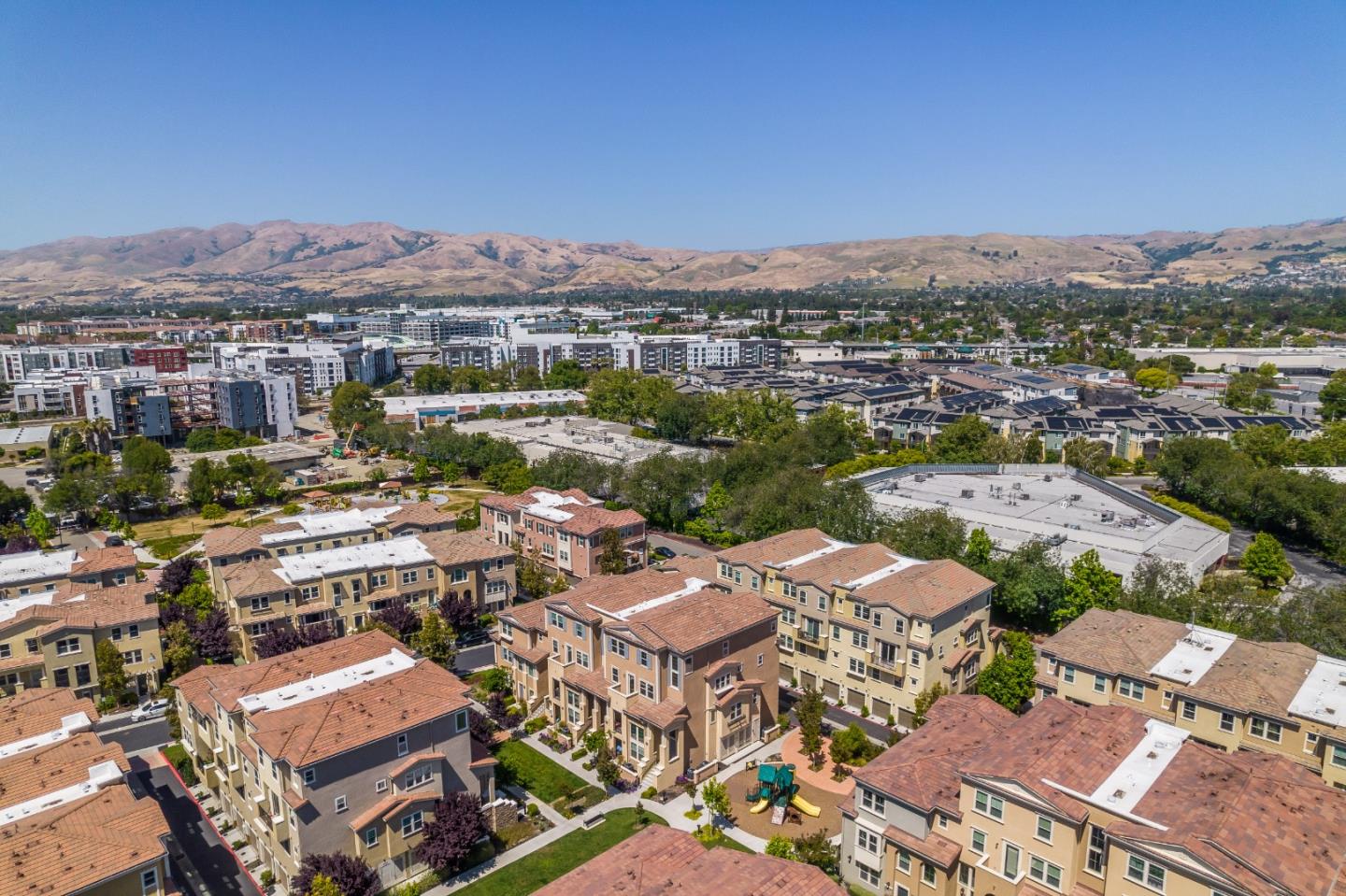 1872 Trento Loop Milpitas, CA 95035 - Photo 33 of 38 an aerial view of a city with lots of residential buildings