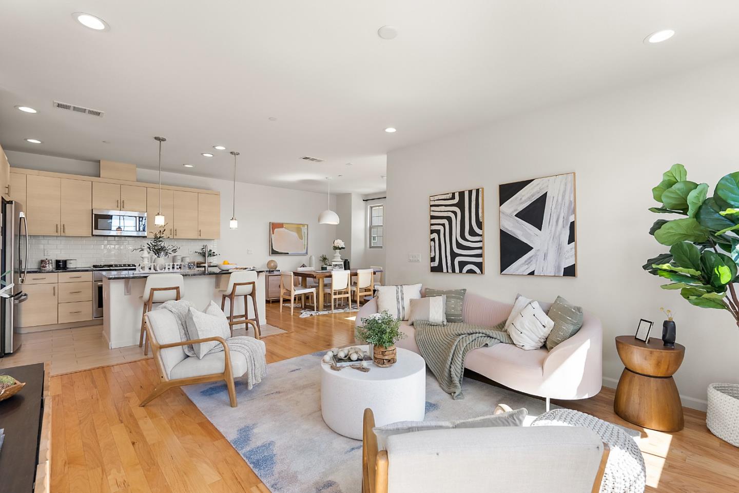 1872 Trento Loop Milpitas, CA 95035 - Photo 6 of 38 a living room with furniture and a kitchen view