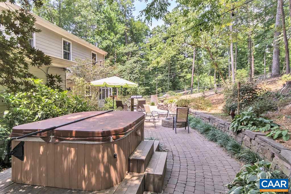 2333 Whippoorwill Road Charlottesville, VA 22901 - Photo 17 of 49 a view of house with backyard and furniture
