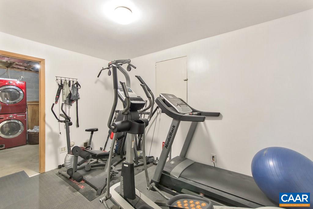 2333 Whippoorwill Road Charlottesville, VA 22901 - Photo 39 of 49 a view of a room with gym equipment