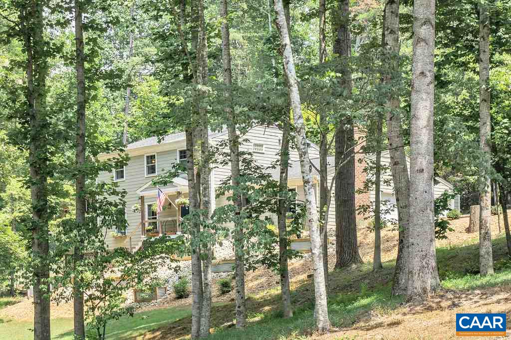 2333 Whippoorwill Road Charlottesville, VA 22901 - Photo 44 of 49 a aerial view of a house with a yard and large trees