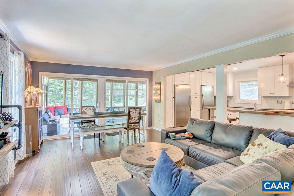 2333 Whippoorwill Road Charlottesville, VA 22901 - Photo 6 of 49 a living room with furniture and wooden floor