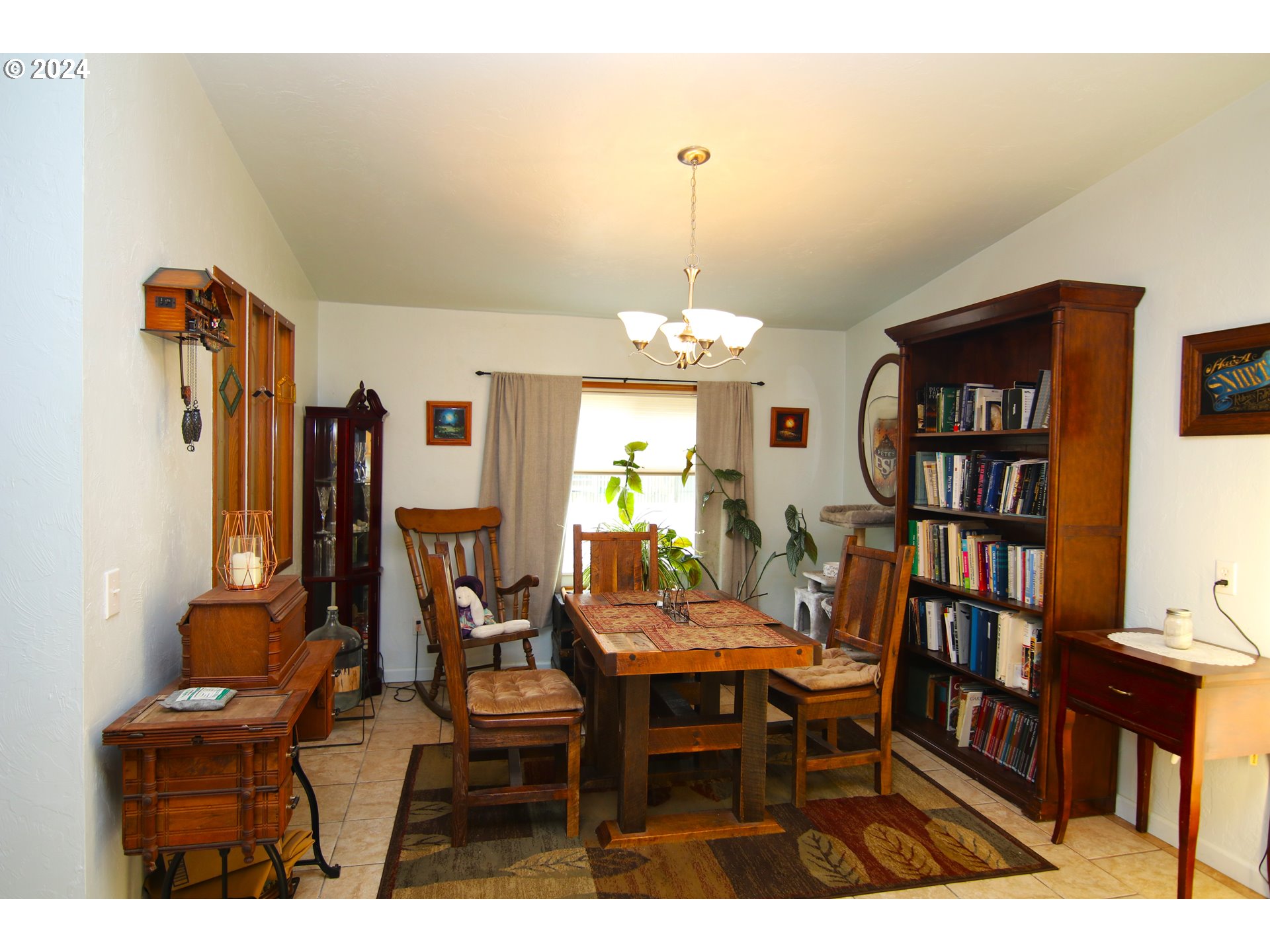 100 River Bend Road, Unit 110 Reedsport, OR 97467 - Photo 8 of 16 a view of a dining room with furniture