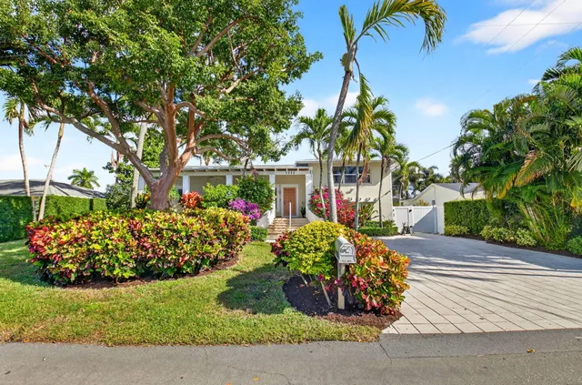 front view of a house with a street