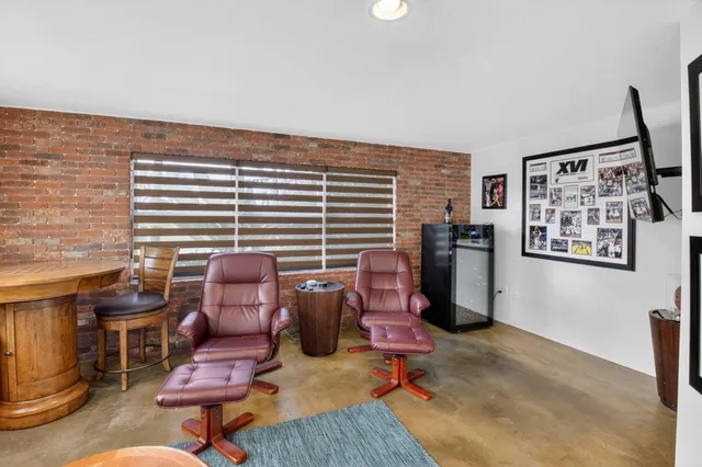 a view of a livingroom with furniture